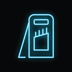 Blue glowing neon sign representing a gas station with a black background
