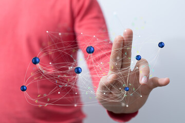 Hand interacting with a digital network, illustrating connection and communication.
