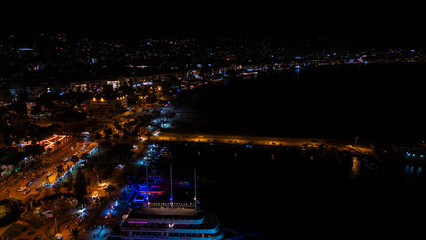 Alanya marina and boats at night with drone