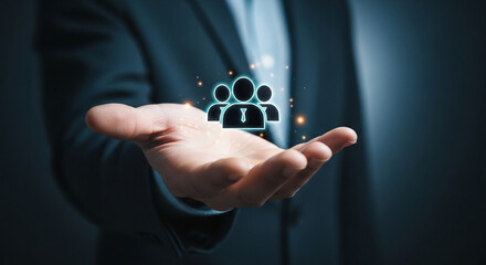 Businessman holding digital icons of people and team management, representing human resources, recruitment, employee data, business leadership, 
