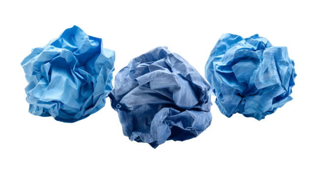 Three crumpled blue paper balls on black background