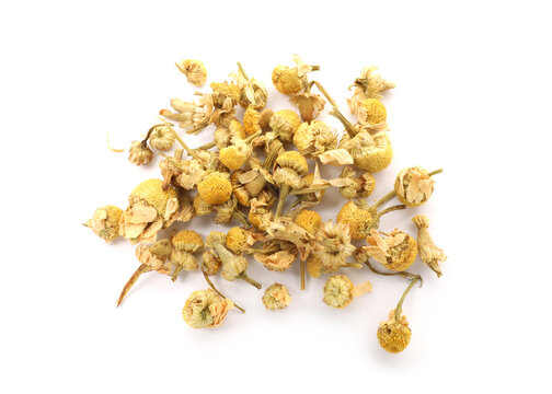 Pile of dry chamomile flowers isolated on white, above view - Powered by Adobe