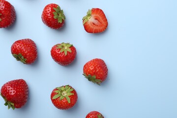 Fresh ripe strawberries on light background, flat lay. Space for text