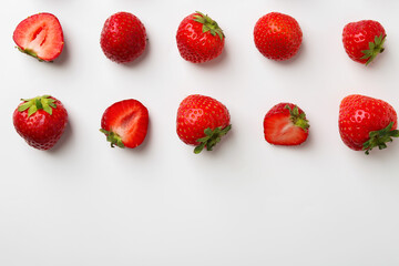 Fresh ripe strawberries on white background, flat lay. Space for text