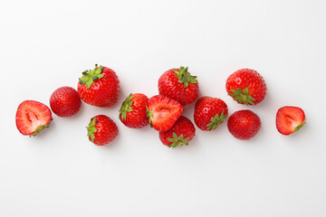 Fresh ripe strawberries on white background, flat lay