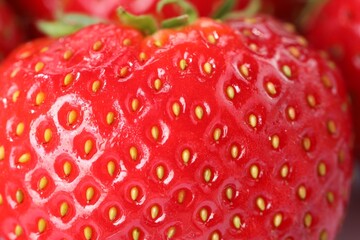 Fresh ripe strawberry as background, macro view