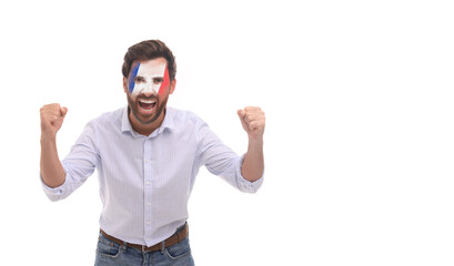 Excited fan with flag of France painted on his face against white background. Banner design with...