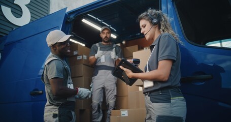 Outside of Logistics Warehouse: Diverse Employees Loading Delivery Truck with Cardboard Boxes,...