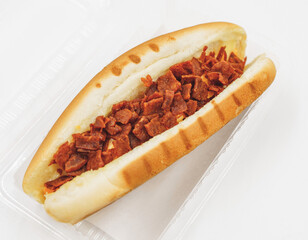 Crispy bacon hotdog on white background