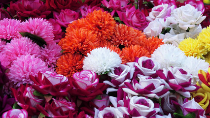 Bouquets of beautiful artificial flowers displayed in a fancy shop