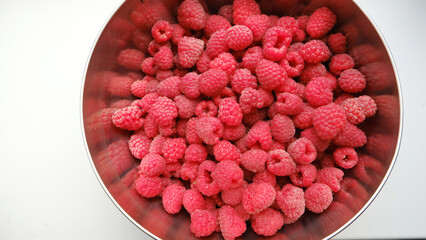 raspberries in a plate