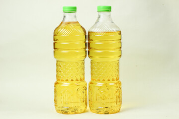 Cooking oil in bottles on a white background. close up.