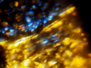 Colorful light leaks on black background for design and special effects. Retro film look. Abstract...