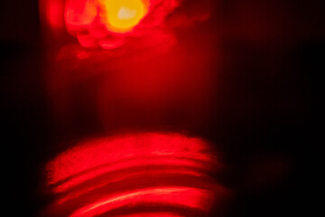 Abstract background with red color light leaks for design and special effects. Random form and...
