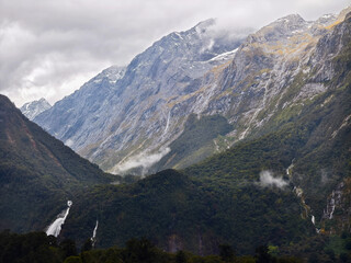 Bowen Falls and Misty Mountains in Milford Sound, New Zealand