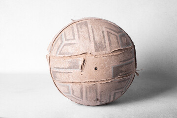 Close-up of an old, battered volleyball.