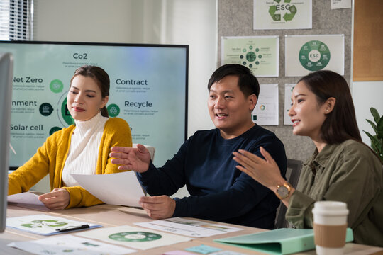 Asian business team online meeting with clients to discuss sustainable business practices focuses on reuse, recycling, and environmental protection to support ESG goals and build a greener future.