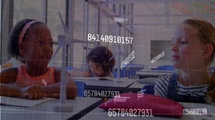 Girl in pink top spinning wind turbine blade in classroom viewing holographic data for learning - Powered by Adobe