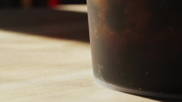 Bubble milk tea with black tapioca in plastic glass, supermarket chinese drink, tasty dessert, close up macro. 