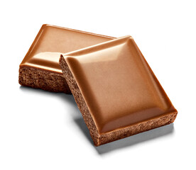 close up of chocolate pieces on white background