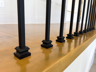 Close-Up of Upper Stair Spindles on Wood Rail