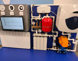 The control panel of the water supply system, with switches and indicators.