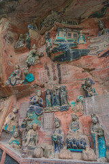 Fototapeta premium chongqing.china 26.03.2024 Ancient Stone Carvings of Dazu Rock Carvings in Chongqing, China – A Glimpse into Buddhist and Taoist Heritage