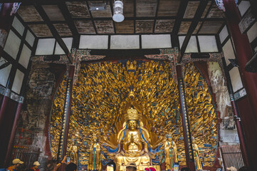 chongqing.china 26.03.2024  Thousand Armed Guanyin Statue at Baodingshan, Dazu Rock Carvings, China