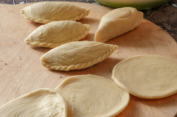National Azerbaijani pastry with nuts - shekerbura, making pies