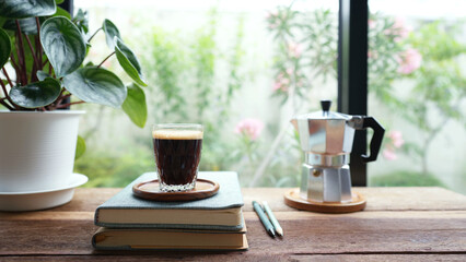 Coffee and silver moka pot rustic wooden table