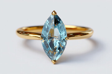 A photorealistic royal gold ring with a marquise-cut aquamarine