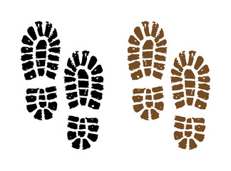 Two pairs of boot footprints, one black and one brown, on white background