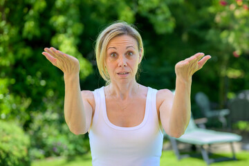 Confused Woman Gesturing With Hands