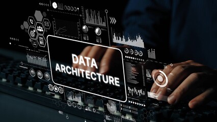 Hands Typing on Keyboard with Overlay of Data Architecture Visualizations and Graphs in Dark...