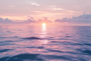 Tranquil sunset over a calm sea.  Soft hues of pink and purple paint the sky and water