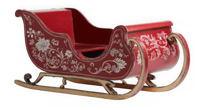 A red wooden sleigh with white floral designs isolated on transparent background, perfect for christmas decorations