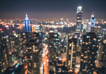 Obraz premium Dreamy Cityscape Night Lights Blur. Captivating nocturnal view of an illuminated urban landscape. The soft focus evokes a serene, ethereal, and modern metropolitan experience.