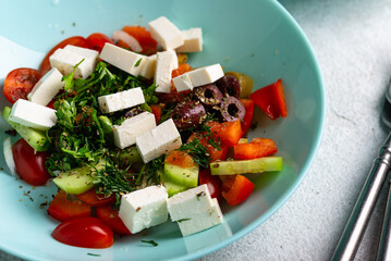 Greek salad with vegetables, olives and feta cheese