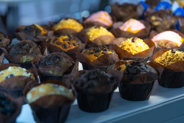 Colorful assortment of freshly baked muffins displayed on a table
