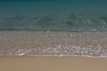 Beach with waves in Greece