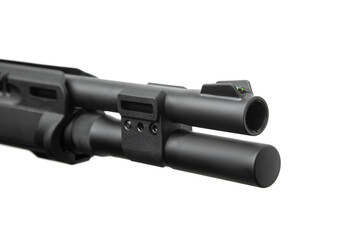 Shotgun barrel close-up with fiber optic front sight and magazine extension tube, isolated on white...
