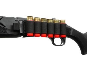 Shotgun with a sidesaddle shell holder loaded with red 12-gauge shotgun shells.