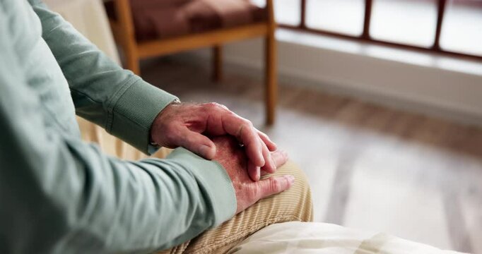 Anxiety, concern and stress with hands of old person in bedroom of retirement home for uncertainty. Afraid, thinking and worry with nervous senior in apartment for difficulty, phobia or memory loss