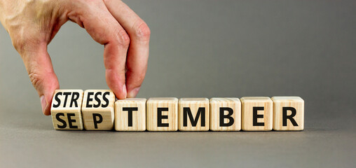 September is Stresstember symbol. Concept words September is Stresstember on beautiful wooden blocks. Beautiful grey table grey background. Business September is Stresstember concept. Copy space.