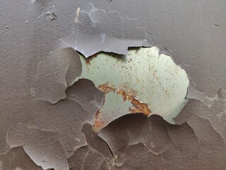 Multi-layered peeling paint texture with green and gray for abstract backgrounds and grunge art...