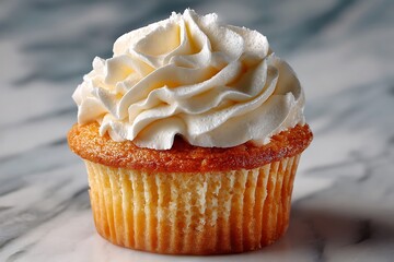 Yummy vanilla cupcake with whipped cream on marble top  
