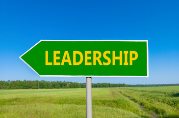Leadership symbol. Concept word Leadership on beautiful green road sign. Beautiful blue sky green grass and forest peaceful nature background. Business leadership concept. Copy space.