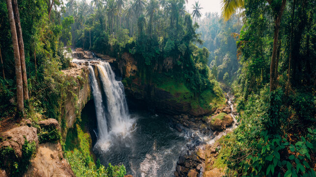 Majestic waterfall cascading into a serene jungle pool surrounded by lush greenery