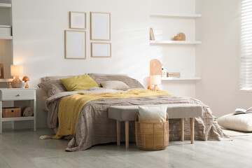 Comfortable bed with beautiful linens in bedroom