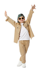 Happy little boy in sunglasses and baseball hat dancing on white background